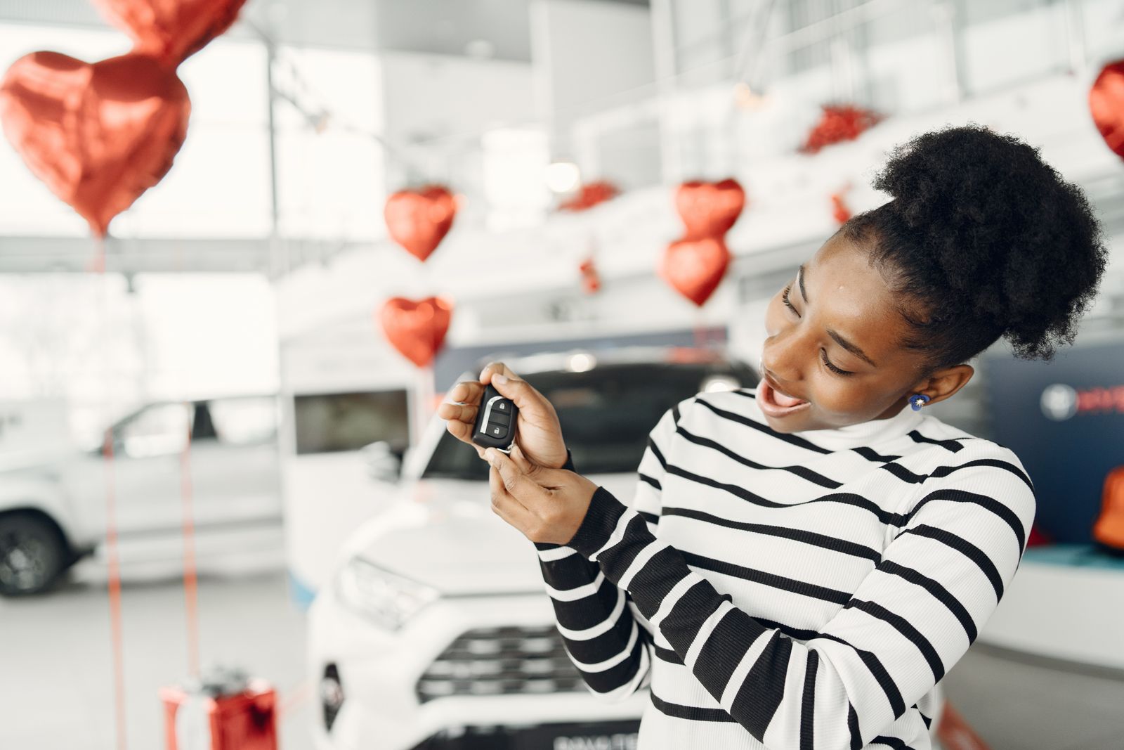 A customer collecting keys at Apex